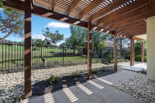 view of patio / terrace with fence and a pergola