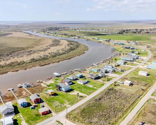 aerial view featuring a water view and a residential view