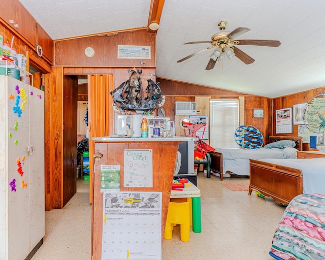 interior space with wood walls and vaulted ceiling