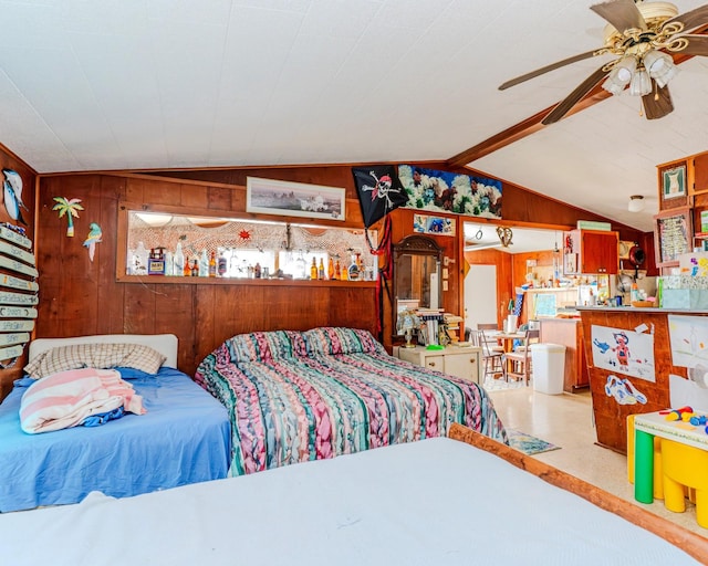 bedroom with vaulted ceiling and wood walls