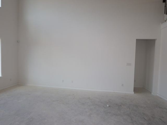 8502 Pier Cove Dr, Cypress, TX 77433 - unfurnished room featuring baseboards and concrete floors