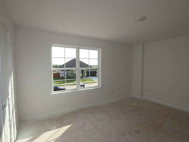 8502 Pier Cove Dr, Cypress, TX 77433 - spare room featuring baseboards