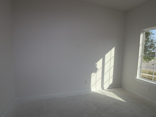 8502 Pier Cove Dr, Cypress, TX 77433 - spare room featuring concrete floors and baseboards