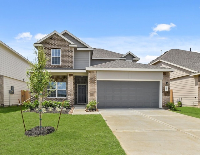 16539 Willow Forest Dr, Conroe, TX 77302 - view of front facade featuring brick siding, a shingled roof, a garage, and driveway