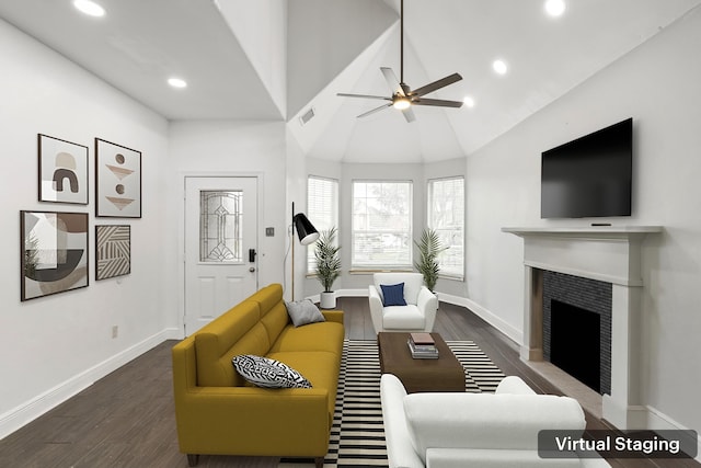 living room featuring a tile fireplace, recessed lighting, visible vents, baseboards, and dark wood-style floors