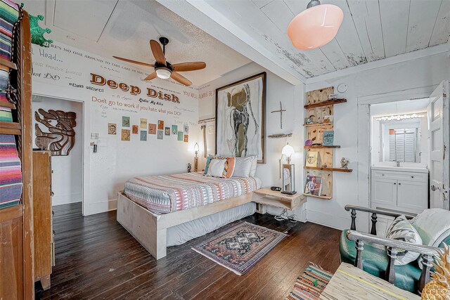 912 Broadway St, Galveston, TX 77550 - bedroom featuring wood-type flooring, a sink, and baseboards