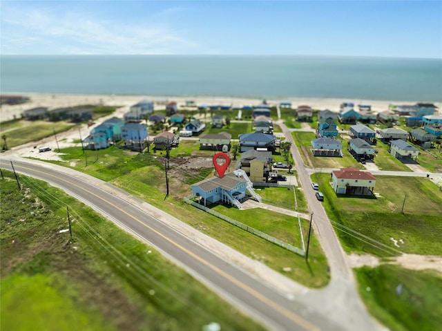 aerial view with a water view and a residential view