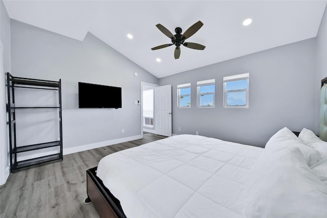 bedroom featuring lofted ceiling, recessed lighting, visible vents, wood finished floors, and baseboards