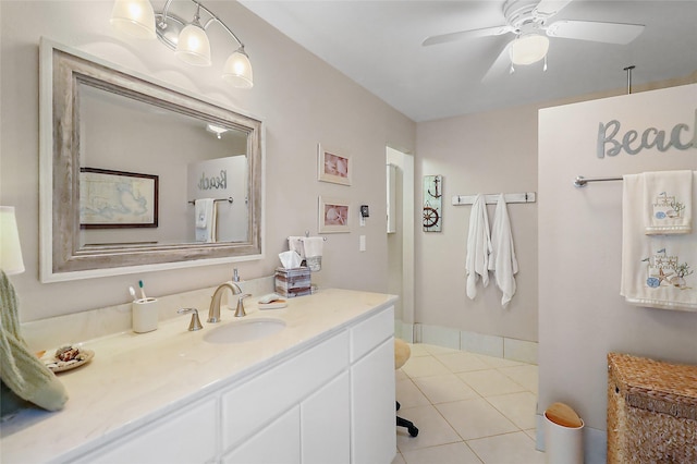 bathroom with ceiling fan, vanity, and tile patterned floors