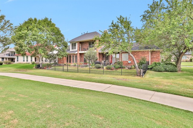 55 Monterrey Rd E, Montgomery, TX 77356 - view of front facade with brick siding
