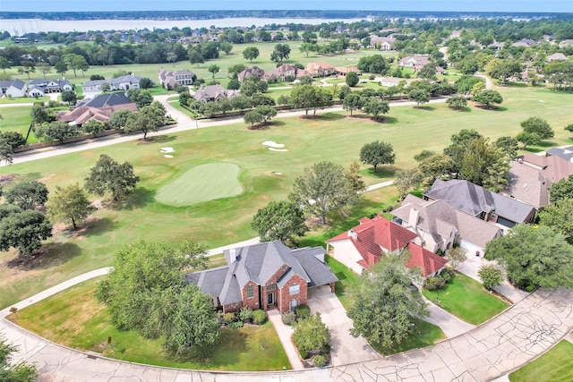 bird's eye view with golf course view and a residential view