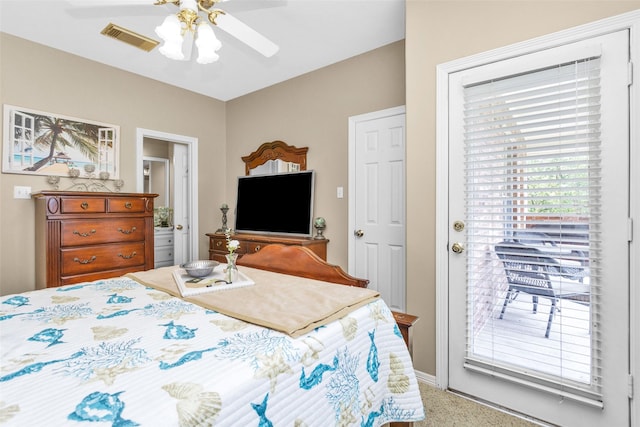 carpeted bedroom featuring a ceiling fan, access to outside, visible vents, and connected bathroom