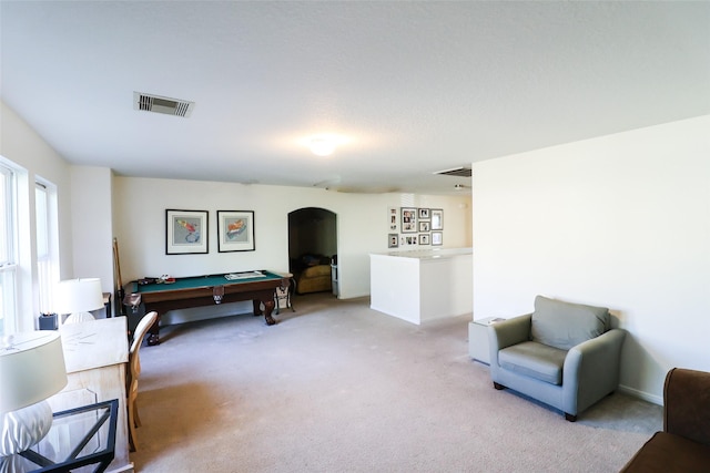 recreation room featuring arched walkways, visible vents, light colored carpet, and pool table