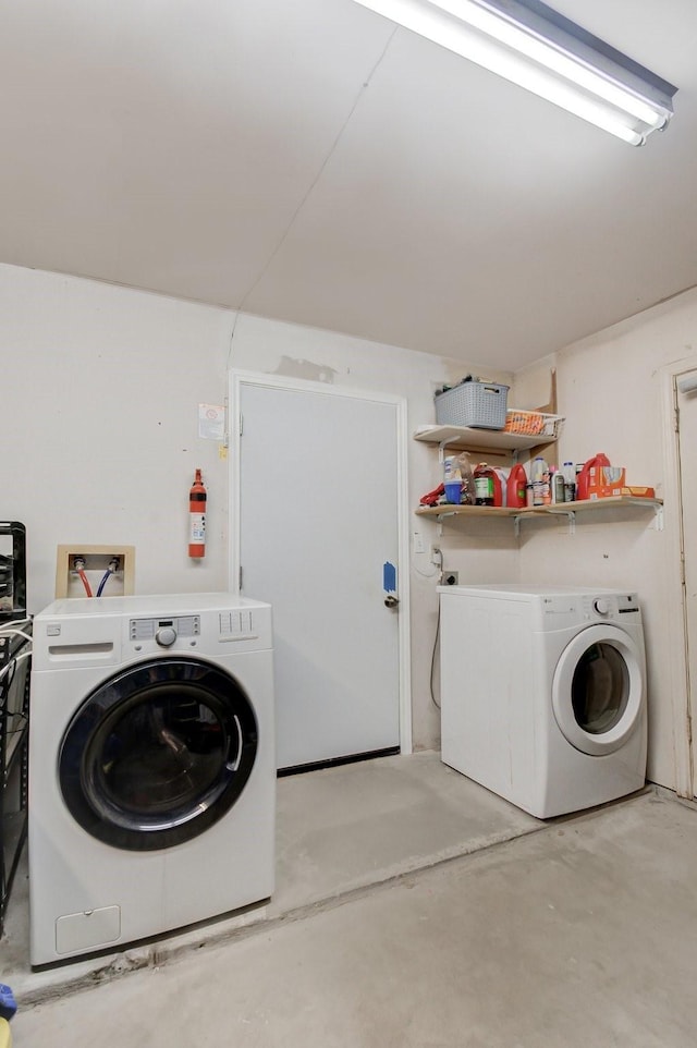 laundry room featuring laundry area and washing machine and dryer