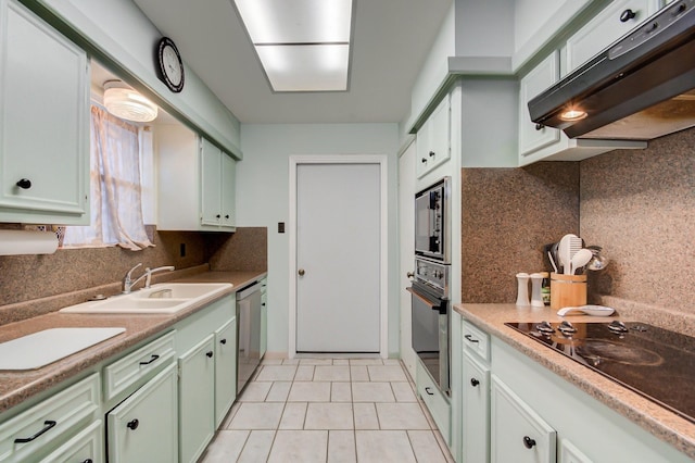 kitchen featuring wall oven, extractor fan, black electric cooktop, and light countertops