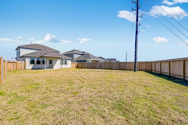 view of yard featuring a fenced backyard