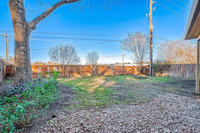 view of yard featuring a fenced backyard