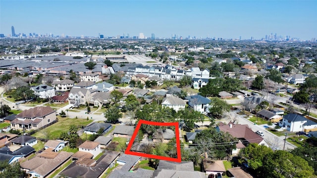 drone / aerial view with a view of city and a residential view