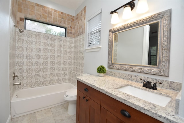 full bathroom with tile patterned flooring, toilet, vanity, and shower / tub combination