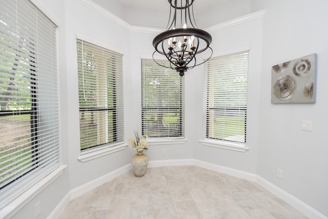 unfurnished dining area with a wealth of natural light, light tile patterned flooring, baseboards, and an inviting chandelier