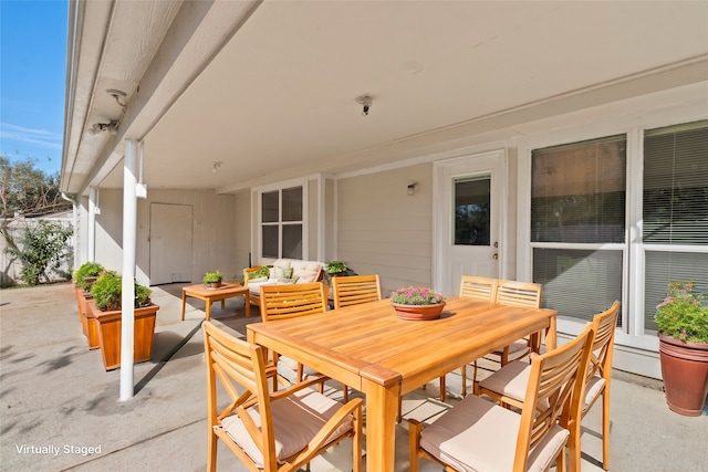 view of patio with outdoor dining space and outdoor lounge area