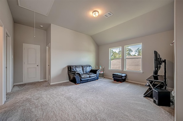 living area featuring attic access, baseboards, visible vents, vaulted ceiling, and carpet flooring