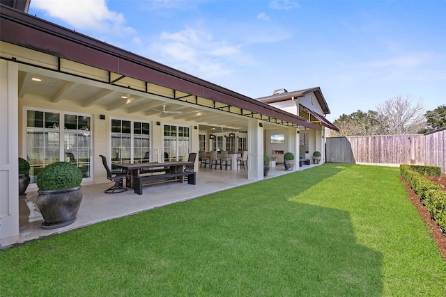 view of yard featuring a patio area and fence