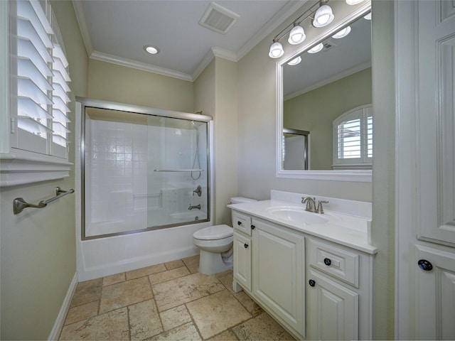 full bath with enclosed tub / shower combo, toilet, stone tile floors, visible vents, and crown molding