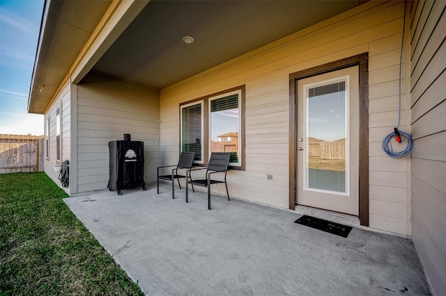 view of patio with fence