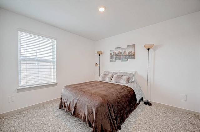 bedroom with recessed lighting, carpet flooring, and baseboards