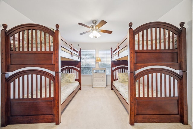 carpeted bedroom with baseboards