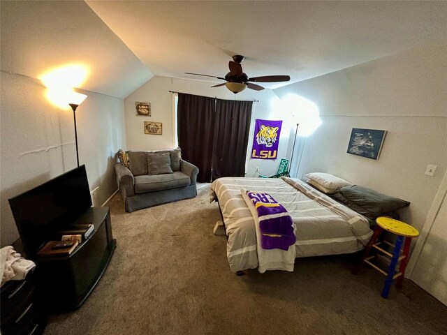 bedroom featuring carpet floors, lofted ceiling, and a ceiling fan