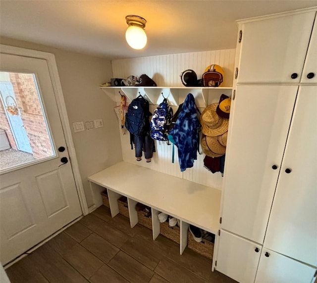 mudroom with wood tiled floor