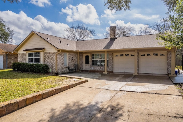 ranch-style house with driveway, a shingled roof, a chimney, an attached garage, and a front yard