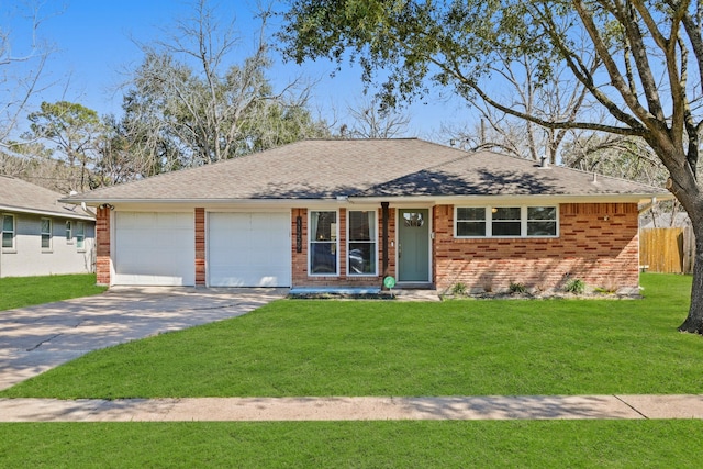 ranch-style house featuring a garage, driveway, a shingled roof, and a front lawn