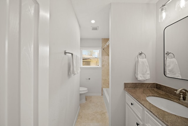 bathroom featuring baseboards, visible vents, vanity, and toilet