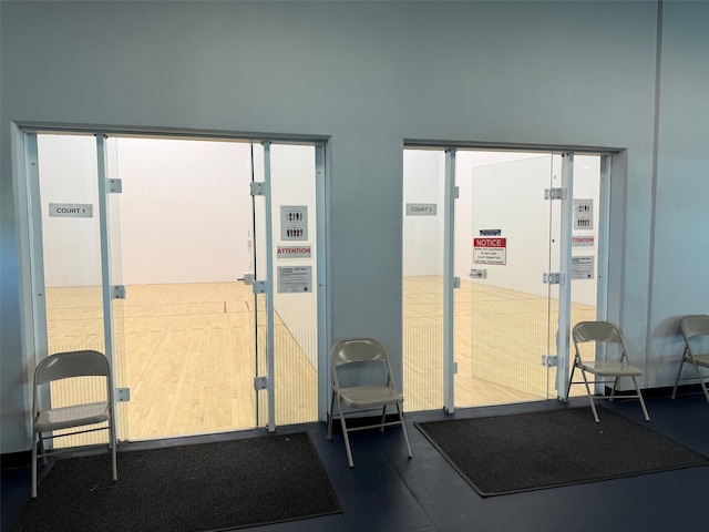 interior space with a sport court