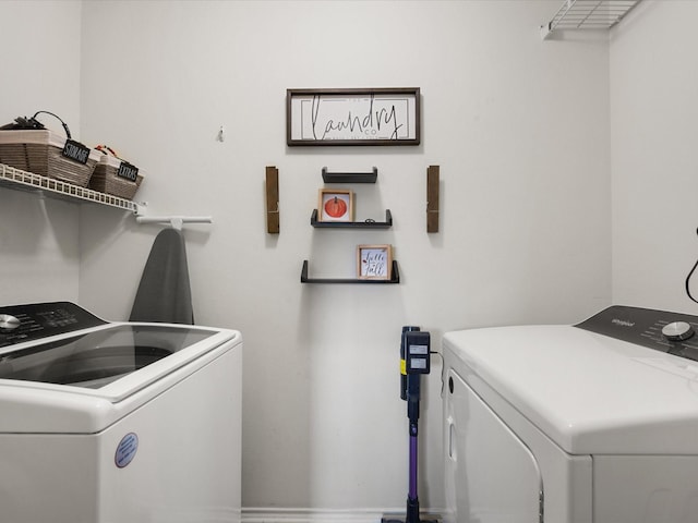 laundry area featuring independent washer and dryer and laundry area