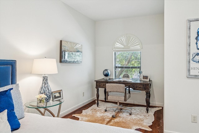 home office with wood finished floors and baseboards