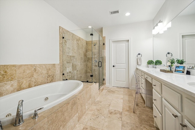 bathroom with double vanity, a stall shower, visible vents, a tub with jets, and a sink