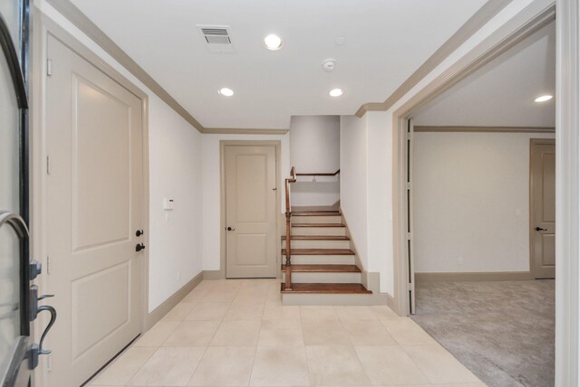 314 W Clay St, Houston, TX 77019 - entryway with baseboards, stairs, recessed lighting, ornamental molding, and light colored carpet