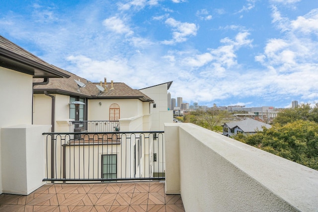 balcony featuring a city view