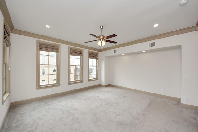 314 W Clay St, Houston, TX 77019 - empty room with a ceiling fan, light colored carpet, crown molding, baseboards, and recessed lighting