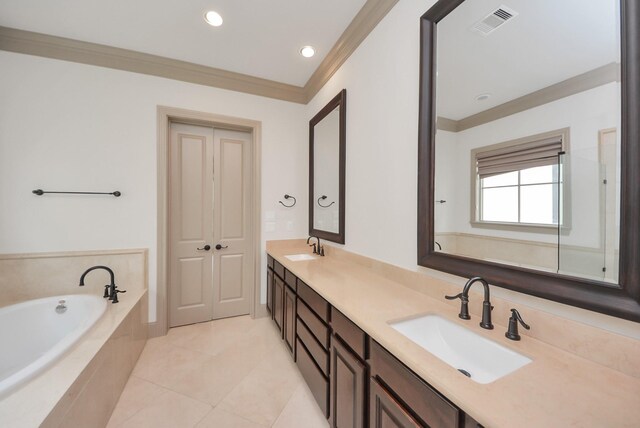 314 W Clay St, Houston, TX 77019 - full bathroom with crown molding, double vanity, a bath, tile patterned flooring, and recessed lighting