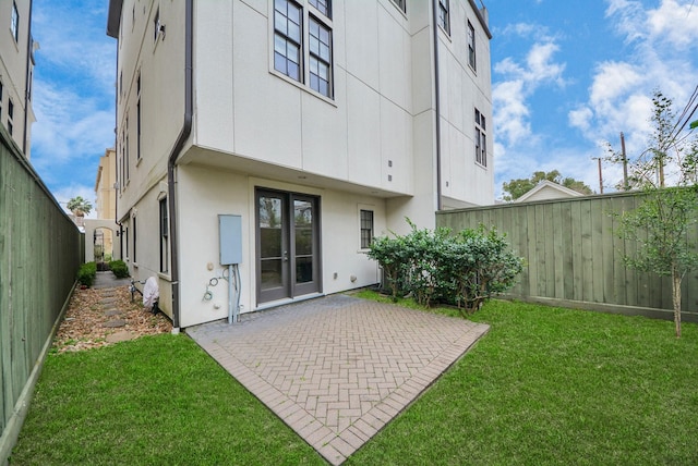 314 W Clay St, Houston, TX 77019 - rear view of property with a patio, french doors, and stucco siding