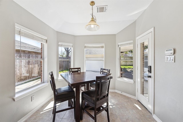 dining area featuring visible vents, baseboards, and light tile patterned floors