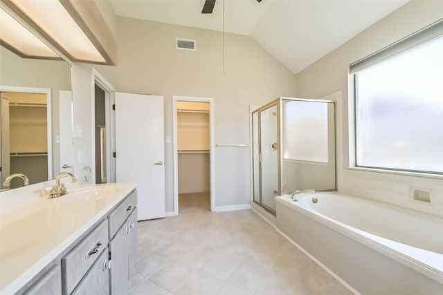 full bath featuring lofted ceiling, visible vents, a shower stall, and vanity