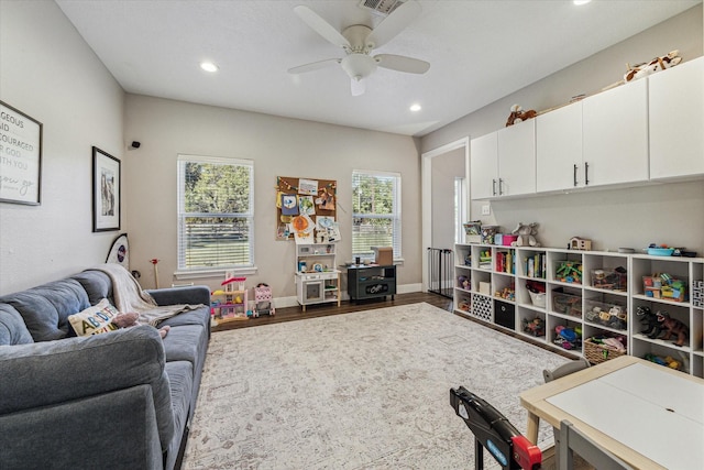 playroom featuring ceiling fan, baseboards, wood finished floors, and recessed lighting