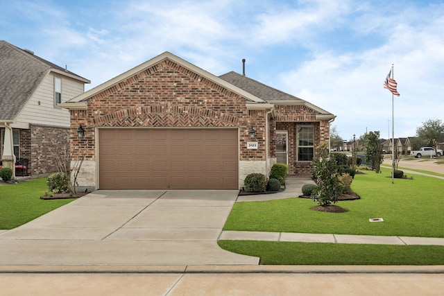 view of front of house featuring a garage, brick siding, a shingled roof, driveway, and a front lawn