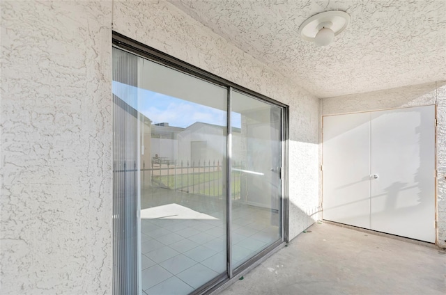 interior space with unfinished concrete floors